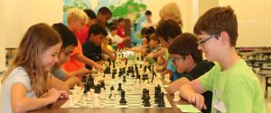 Children competing in Kid Chess tournament